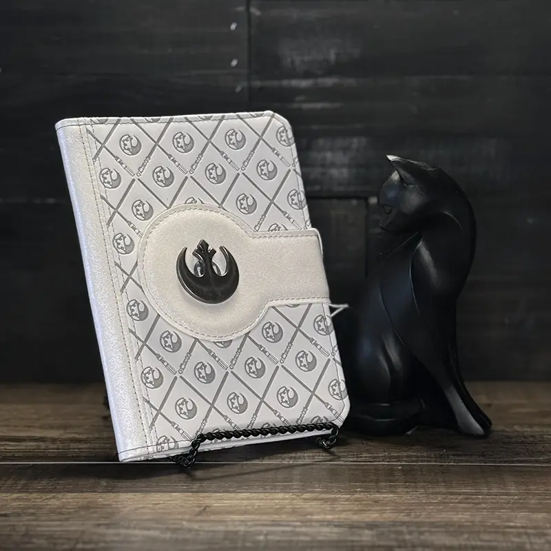 an ebook cover with embossed green vinyl and a leaf magned closure